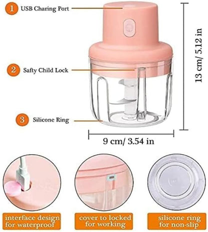 Pink handheld chopper with labeled features and dimensions